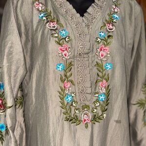 Kashmiri-style pheran tunic top featuring intricate colorful floral embroidery